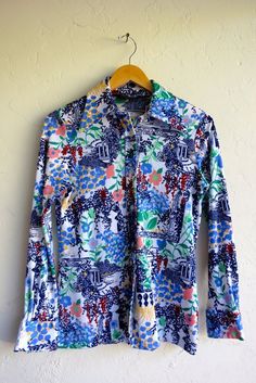 Make this beautiful vintage floral shirt.Listed Size: Women's 12 Estimate Size: SBrand: SwankLength: 24.5“Bust: 34“Waist: 33”Shoulder: 14”Sleeve: 22“Sleeve Opening: 7” Multicolor Floral Print Shirt With Spread Collar, Multicolor Floral Print Top With Spread Collar, Multicolor Floral Print Tops With Spread Collar, Multicolor Floral Print Button-up Shirt, Collared Multicolor Floral Print Top, Classic Floral Print Button-up Shirt, Patterned Collared Shirt With Floral Print, Collared Floral Print Patterned Shirt, Collared Shirt With Floral Print In Patterned Color