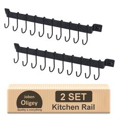 two sets of kitchen rails with hooks on each side and one set of clips attached to the wall