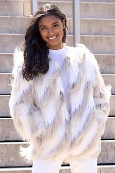 White Faux Fur Trim Outerwear For Fall, White Outerwear With Faux Fur Trim For Fall, White Long Sleeve Spring Fur Coat, White Long Sleeve Fur Coat For Spring, White Long Sleeve Outerwear With Faux Fur Trim, White Faux Fur Lined Coat, Chic White Outerwear With Faux Fur Lining, White Fur Coat With Faux Fur Lining, Chic White Faux Fur Outerwear