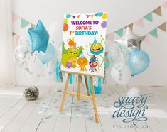 a welcome sign with balloons and streamers in front of it for a birthday party