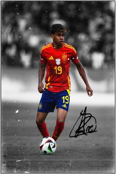 a soccer player with a ball in his hand and signed autograph on the photo