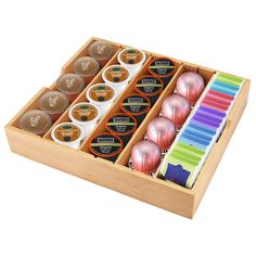 a wooden box filled with lots of different types of condiments