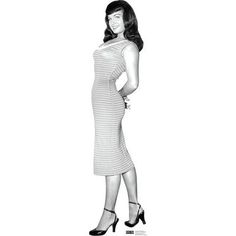 a black and white photo of a woman in a dress with her hands on her hips