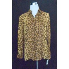 Lauren Ralph Lauren Leopard Print Silk Blouse M Leopard Print Silk Blouse Is Done In Various Shades Of Brown. Blouse Is Collared And Buttons Down The Front. The Long Sleeves Have 2 Buttons On The Cuffs To Adjust The Fit. Blouse Has A Straight Bottom With Slits On The Sides. New With Tags With Extra Buttons. Please Compare The Measurements To Something You Already Own That Fits You Well. Marked Size Medium Bust 44 Waist 40 Hips 42 Sleeves Measure From Shoulder 25 Shoulder To Shoulder 16 Length 26 Gold Shirt For Workwear In Fall, Gold Blouse For Workwear In Fall, Gold Fitted Casual Blouse, Fitted Brown Shirt, Gold Collared Blouse For Fall, Fitted Gold Blouse For Office, Classic Yellow Blouse, Linen Shorts Women, Safari Shirt