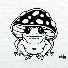 a frog wearing a mushroom hat on top of it's head with polka dots