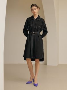 Editor's notesIt is a shirt dress inspired by trench coat design. The dress features a belt, hidden button, top-stitching point, pockets on the front, and side slits. It is a refreshing dress made of cotton fabric.- Relaxed fit- Trench coat design- Top-stitching point- Side slits- 100% CottonMeasurements(in.)One Size- Shoulder: 21.3 in.- Chest: 22.8 in.- Hem: 24.6 in.- Sleeve Length: 20.3 in.- Sleeve: 9.1 in.- Front Length: 39.4 in.- Back Length: 40.9 in.*Model info- Height 5’ 9” Bust 34” Waist Black Long Sleeve Belted Dress For Spring, Black Belted Dress For Office In Spring, Black Belted Dress For Office And Spring, Fall Workwear Shirt Dress With Belted Cuffs, Black Shirt Dress With Placket For Spring, Collared Belted Dress For Work In Fall, Spring Workwear Shirt Dress With Belted Cuffs, Knee-length Belted Outerwear For Work, Fall Collared Belted Dress For Work