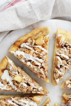 a white plate topped with slices of apple pie