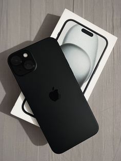 an iphone 11 is sitting on top of the box next to it's packaging