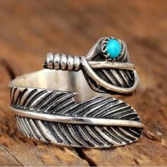 Around A Size 6.5 7. Open Ring Design To Fit Most Fingers. High-Quality Material. Made Of Durable, Long, Lasting Alloy Metal And Turquoise Stone. Feather Ring Silver, Feather Ring, Turquoise Boho, Silver Feather, Turquoise Cuff, Thumb Rings, Wrap Rings, Bohemian Jewelry, Boho Hippie