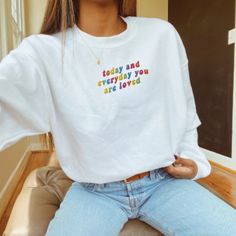 Get ready to fall in LOVE with your new rainbow embroidered 'you are so loved everyday' sweatshirt. It's the cutest and most comfortable way to show off the latest styles. Also makes a great gift! * PRODUCT DETAILS * ✺ Soft preshrunk 50% cotton, 50% polyester blend ✺ Medium weight fabric (super soft feel) ✺ Wash and dry normally (on cool for best results) ✺ Designed and printed in the USA ✺ Due to different monitor screens, colors may vary ✺ * SIZING * ✺ FOR AN OVERSIZED FIT, SELECT TWO OR THREE Casual Rainbow Crew Neck Sweatshirt, Rainbow Cotton Crew Neck Sweatshirt, White Sweatshirt With Letter Embroidery For Everyday, White Everyday Sweatshirt With Letter Embroidery, White Sweatshirt With Letter Embroidery, Everyday White Tops With Letter Embroidery, Turtle Sweaters, Preppy Sweatshirts, California Sweatshirt