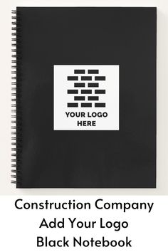 a black notebook with the words construction company and an image of a block logo on it