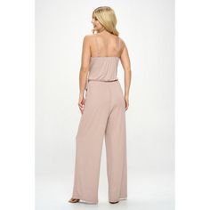 This is a chic and effortlessly stylish side tie jumpsuit composed of a soft knit fabric. This jumpsuit is perfect for those on the go who wants to look and feel her best without any hassle. Envision yourself stepping out in this beautiful jumpsuit, pairing it with your favorite accessories and footwear for a look that's as unique as you are. Material - 95% Rayon Modal 5% Spandex. Made in USA Chic Summer Rayon Jumpsuits And Rompers, Chic Rayon Jumpsuits And Rompers For Summer, Chic Rayon Jumpsuits And Rompers For Spring, Sleeveless Jumpsuits And Rompers With Tie Waist For Loungewear, Casual Tie Waist Jumpsuits And Rompers For Party, Beige Casual Jumpsuits And Rompers For Party, Casual Beige Jumpsuits And Rompers For Party, Chic Tie Waist Jumpsuits And Rompers For Day Out, Chic Tie Waist Jumpsuit For Day Out