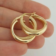 Real 14k Yellow Gold Fancy Frosted Double Hoop Earring 21mm Gift For Mom Christmas Gift * Comes as a pair. * The product is made of 100% 14k Solid Gold and it has a 14K or 585 stamp on item. * The package includes a gold certificate. * Every package comes in a gift box. * Ships from a small business inTurkey 14k gold does not oxidize or discolor, so you can wear your jewelry every day, anywhere! Gold Hoop Earrings Stamped 14k For Gift, Gold Hoop Earrings Stamped 14k As Gift, Gold 14k Stamped Hoop Earrings As Gift, Hallmarked Hoop Huggie Earrings For Gift, Gift Hallmarked Hoop Huggie Earrings, 14k Gold Round Hoop Earrings For Gift, Cadmium-free Huggie Hoop Earrings Gift, Gift Huggie Hoop Earrings, Gold Hoop Earrings Stamped 14k For Anniversary