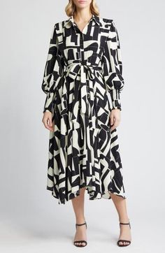 This bold midi features an artistic abstract print, smocked cuffs and a handkercheif hem that create a flowy silhouette with definition in the right places. 49" length (size Medium) Hidden-button placket Spread collar Long sleeves with smocked cuffs Tie belt Partially lined 100% polyester Hand wash, dry flat Imported V-neck Dress With Abstract Print For Fall, Long-sleeved Belted Midi Dress In Viscose, Elegant Maxi Dress With Abstract Print And V-neck, Black V-neck Dress With Abstract Print, Multicolor Print V-neck Maxi Dress With Abstract Design, Belted Midi Dress, Belt Tying, Tie Belt, Nordstrom Dresses