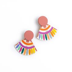 Inspired by the Talavera tiles in Mexico, our Rainbow Tile Earrings are hand painted in a variety of colors on natural buffalo horn to represent the Spanish history and craftsmanship of the luxurious haciendas. These lovely stud earrings will become your new favorite summer accessory. Color: Yellow, pink, orange, blue, Spanish History, Rainbow Tile, Tile Earrings, Rainbow Sunset, Derby Fascinator, Talavera Tiles, Clover Earrings, Rainbow Earrings, Holiday Earring