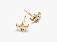 A royal earring fit for the queen. 14K gold marquise crown stud earrings are perfect accessory to add to your day or night look. A classic that will never go out of style.FEATURES• Made to Order• Gold Kt: 14k Solid Gold, 18k Solid Gold• Gold Color: Rose Gold, Yellow Gold, White Gold• Width x Height: 7.85 mm x 5.70 mm • Gemstone: Diamond• Diamond Cut: Marquise• Diamond Color - Clarity: G Color - SI1 Clarity• Number of Stones and Size: 4.00 mm x 2.00 mm, 6 pcs in total• Total CTTW: 0.60 ct tw (for Marquise Diamond, Diamond Color, Night Looks, Gold Gold, Gold Yellow, Diamond Cut, The Queen, Colored Diamonds, Solid Gold