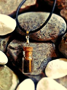 "Deburca art Irish glass vial. 18\" chain or black choker with miniature glass vial attached.  Vial filled with a choice of Irish soil or coastline sand. Warm sentimental gift which means a part of Ireland is always with you. Take your pick from soil from Dublins famous Phoenix Park, Galways wild Atlantic way or from the ancient celtic Irish site of the navan fort in Armagh.   Or if you would rather sand from Galways Salt hill or Donegals beautiful Rossnowlagh beach." Armagh, Vial Necklace, Wild Atlantic Way, Irish Celtic, Hippie Necklace, Glass Vials, Black Choker, Galway, Sentimental Gifts