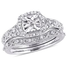 a wedding ring set with a square diamond center and two rows of round diamonds on each band