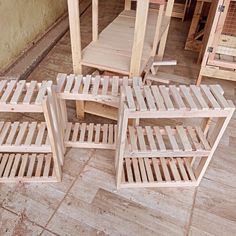 several pieces of wood sitting on top of a wooden floor