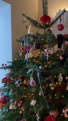 a decorated christmas tree with ornaments on it