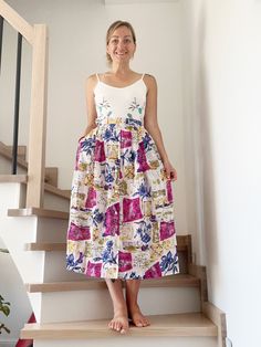 This vintage women's A-line skirt, falling just below the knee, features a delicate floral/abstract print and is perfect for summer. Its lightweight fabric ensures a breezy and comfortable fit for warm days, complemented by convenient pockets and a stretchy waistband. This design accommodates sizes from M to XL, making it versatile and ideal for pregnancy, providing both style and comfort. Materials: Polyester/Cotton (very light) Size L on tag, but please check the measurements before buying: Wa Cotton A-line Skirt With Floral Print, Fitted Midi-length Summer Skirt, Fitted Midi Skirt For Summer, Fitted Midi Length Summer Skirt, Summer Long Printed Skirt, Printed Long Skirt For Summer, Cotton A-line Summer Skirt, Summer Printed Cotton Skirt, Summer Cotton Printed Skirt