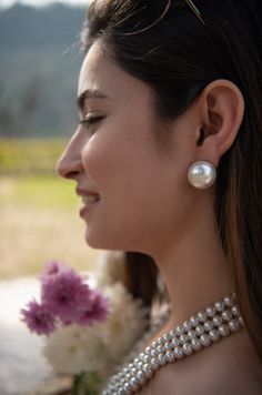 Wear the beauty of nature with our dreamy Pearl stud earrings that give you an essence of modern luxury. Our delicate Pearl Earrings are here to give you the breezy beach vibes. Inspired by modern jewelry, the classic gigantic pearl add an absolute icon energy to your attire. These pearl stud Earrings are perfect companions for your romantic beach dates.    Closure: Push Back handcrafted in Jammu and Kashmir Paisley Pop travels the depths of India to learn techniques and crafts from deep down in the local markets and villages. We give utmost importance to our quality and packaging. Our goal is to make sure you receive exactly what you are looking for and for your experience to be a special and memorable one. We are ready to help and advise you through your purchase.  IT' S  A W E S O M E * Beach Dates, Delicate Pearl Earrings, Natural Pearl Earrings, Earrings Beach, Beach Date, Pearls Earrings, Romantic Beach, Jammu And Kashmir, Kundan Necklaces