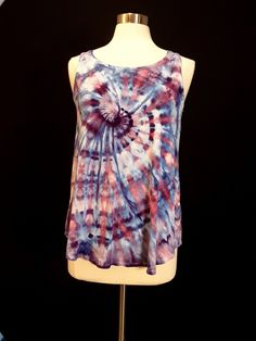 Small ice dye tank top in lilac, pink, and lavender swirl design. Super soft, flowy, and comfortable rayon. You won't believe how wonderful this is to wear!  I use only the highest quality fiber reactive procion dyes, so the color will last for years to come. The item has been washed and dried twice during the dye process. I know rayon says to hand wash, but it does fine on the gentle cycle in the machine. I also fluff dry it after air drying to make it softer.  My items are dyed one at a time b Hand Dyed Multicolor Sleeveless Tops, Purple Hand Dyed Tops For Spring, Multicolor Hand Dyed Sleeveless Tops, Multicolor Hand-dyed Sleeveless Top, Casual Hand Dyed Tank Top, Casual Hand-dyed Tank Top, Hand Dyed Tie Dye Sleeveless Tank Top, Hand Dyed Sleeveless Top For Spring, Hand Dyed Sleeveless Tank Top For Spring