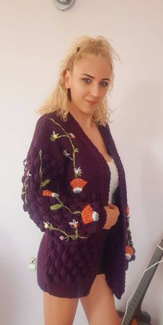 famous plum color mushroom daisy cardigan with quality yarns that you can wear for years It is knitted, the trendy hand knitted mushroom cardigan has been knitted with non-fading threads for many years, plum color country garden cardigan was originally hand knitted by me. You can give it as a gift to your girlfriend, a gift to your wife on your wedding anniversary, or a gift to your mother on mother's day, which will make you feel special. I can knit the main color in the color you want from the Purple Knitted Outerwear For Spring, Purple Knitted Cardigan For Spring, Handmade Purple Cardigan For Fall, Knitted Purple Cardigan For Spring, Embroidered Knit Cardigan For Fall, Purple Crochet Sweater For Fall, Fall Crochet Purple Sweater, Cozy Embroidered Fall Cardigan, Hand Knitted Purple Sweater For Winter