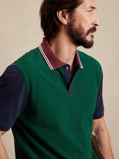 Green Cotton Polo Shirt With Ribbed Collar, Green Cotton Sporty Polo Shirt, Green Cotton Polo Shirt With Collared Neckline, Classic Green Polo Collar Sweater, Green Sporty Cotton Polo Shirt, Sporty Green Cotton Polo Shirt, Green Cotton Short Sleeve Polo Sweater, Green Sporty Polo Shirt, Cotton Polo Shirt With Contrast Stripes For Work