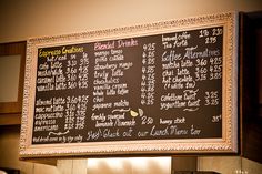 a restaurant menu hanging on the wall