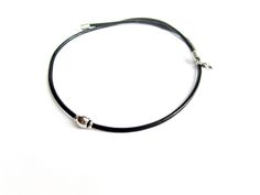 The minimalistic choker necklace for men is a stainless steel bead on a genuine leather cord with stainless steel lobster clasp closure. This stylish and concise choker for every day will be a great gift for him. Necklace length (adjustable): 17-19 inches (43-48 cm) Stainless steel bead: 8 x 6 mm Leather cord thickness: 3 mm For all products are used only genuine high-quality Italian leather, natural stones and wood. All metal materials are lead and nickel free. /Gift wrapping and packaging/ : A Minimalist Leather Jewelry With Adjustable Cord, Minimalist Adjustable Leather Necklace, Adjustable Minimalist Leather Necklace, Minimalist Everyday Jewelry With Adjustable Cord, Minimalist Silver Necklace With Waxed Cord, Minimalist Everyday Leather Necklace, Minimalist Adjustable Choker For Gift, Minimalist Adjustable Choker As Gift, Minimalist Choker With Lobster Clasp As Gift