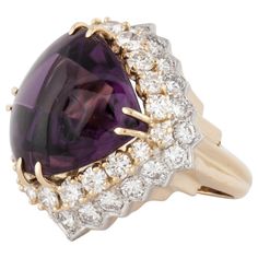 Cabochon Amethyst and Diamond Ring in 18K Gold | From a unique collection of vintage Cocktail Rings at https://www.1stdibs.com/jewelry/rings/cocktail-rings/. Luxury Cabochon Amethyst Ring, Luxury Cabochon Amethyst Engagement Ring, Vintage Cocktail Ring, Amethyst And Diamond Ring, Vs2 Diamond, Cabochon Ring, Amethyst Jewelry, Women Diamond, White Gold Ring