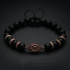 "top jewelry gifts for men and women, gifts for boyfriend, unique gifts ideasRose gold evil eye jewelry Exclusive handmade bracelet made with 8mm Faceted Matte Onyx beads, featuring Rose Gold plated 925 Silver Evil eye charm embellished with black Zircon stones. There are 3 rose gold plated Black Zircon Spacer beads on each side of the evil eye charm. It's adjustable, utilizing a sliding knot made with macrame cord and is easy to put on and take off by yourself. Please choose one of the 2 size o Gold Evil Eye Jewelry, Beaded Bracelets For Men, Husband Gift Ideas, Silver Jewelry For Men, Horn Pendant Necklace, Men Gift Ideas, Top Christmas Gifts, Father Gifts, Men Bracelets