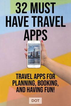 a person holding up a smart phone with the text 32 must have travel apps