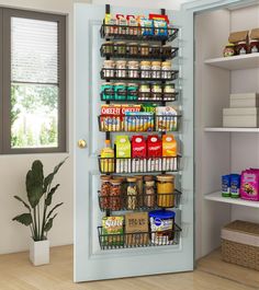 a pantry door is open to reveal the food in it's storage bins