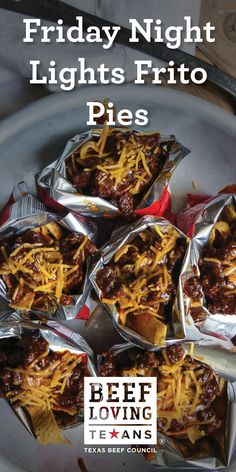 five foil packets filled with chili and cheese on top of a white plate, text reads friday night lights frito pies