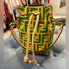 Has Not Left The Closet Once. Brand New. Leather. Does Not Have The Cloth Bag. Long Strap Still Inside As It Came. Beautiful Bag. Color More Accurate In Last Two Photos. Luxury Green Bucket Shoulder Bag, Designer Tan Bucket Bag, Designer Green Bucket Bag, Designer Gold Bucket Bag For Travel, Luxury Green Bucket Bag For Evening, Designer Green Bucket Shoulder Bag, Luxury Yellow Bucket Bag With Removable Pouch, Luxury Yellow Bucket Bag For Shopping, Designer Gold Bucket Bag For Shopping