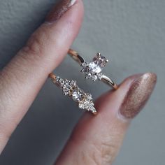 Keeping it sweet and dainty 🍭We love this pastel colors. Showing the Morganite Cupcake ring (top) and the Galactic Salt & Pepper ring (bottom). Also, we are working on more new fine delicates for you! 😘 Discover more on TippyTaste.com #tippytaste #saltandpepperdiamonds 14k Gold Diamond Ring With Si Clarity For Promise, Dainty Diamond Ring With Si Clarity, Celestial Rose Gold Diamond Ring In 14k Gold, Delicate 14k Gold Cluster Ring With Rose Cut Diamonds, Celestial Style 14k Rose Gold Diamond Ring, Dainty Oval Diamond Ring In 14k Gold, Delicate Marquise Cut 14k Gold Jewelry, Delicate 14k Gold Marquise Cut Ring, Dainty Oval Cluster Ring In 14k Gold