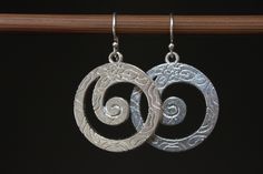 "Silver Dangle Boho Earrings / Dangle Drop Earrings / Boho Jewelry / Bohemian Earrings / Gift for women / Gift for her These boho earrings are made with silver plated swirl featuring floral design. They hang from sterling silver ear wires. They are light, comfortable and easy to wear everyday. Finish of the main pieces : Antique Silver Plated floral swirl Length : 1 3/8 inches including the sterling silver ear wires Ear wires : Sterling silver ear wires For more choices on my silver boho earring Boho Earring, Rustic Earrings, Bohemian Earrings, Fort Collins, Earrings Boho, Earrings Dangle, Etsy Shipping, Bohemian Jewelry, Boho Earrings