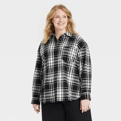 This Oversized Flannel Long-Sleeve Collared Button-Down Shirt from Universal Thread™ makes a versatile addition to your wardrobe. Made from midweight cotton, this collared shirt features a front button placket, long sleeves with buttoned cuffs, a patch pocket on the chest and a box-pleat back yoke for classic touches. The oversized fit and shirttail hemline complete the design, allowing you to wear it tucked in, untucked, layered open and unbuttoned, or with rolled-up sleeves. Universal Thread™: Oversized Collared Winter Blouse, Oversized Collared Blouse For Winter, Oversized Black Button-up Flannel Shirt, Oversized Black Flannel Shirt For Fall, Oversized Button-up Winter Shirt, Winter Oversized Button-up Shirt, Oversized Long Sleeve Flannel Shirt With Buttons, Oversized Flannel, Box Pleats