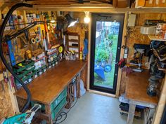 the inside of a garage with lots of tools