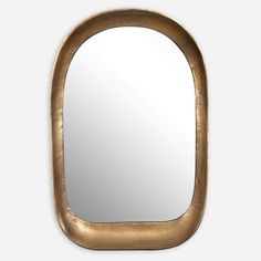 an oval mirror is shown in gold