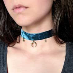 "The perfect gothic charm choker to complete your look! Features a bronze crescent and two star charms on either side. This adjustable necklace is made with Soft and stretchy velvet attaches in the back with a clasp and 2.5\" chain. The velvet part measures about 11.5\". If you need a different size, send me a message and I'll be happy to make it for you! This necklace also comes in other colors so check out my store for more variations!" Festival Choker With Moon Charm, Fairycore Necklace, Crescent Moon And Star, Hippie Nails, Space Fantasy, Velvet Choker, Unisex Necklace, Necklace Display, Moon And Star