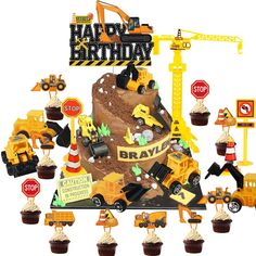 a construction themed birthday cake surrounded by cupcakes