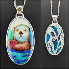 This cloisonne sea otter pendant is made from glass enamel, fine silver, 24k gold and sterling silver. The setting is carved in a kelp motif and the bail is set with a teal sapphire set in 18k gold. Hand Painted Oval Enamel Jewelry, Collectible Enamel Oval Pendant Jewelry, Oval Enamel Inlay Jewelry, Hand Painted Oval Silver Jewelry, Silver Oval Hand Painted Jewelry, Collectible Enamel Jewelry With Oval Pendant, Mason Stains, Otter Necklace, Otter Jewelry