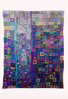 a piece of art that looks like it has been made out of different colored squares