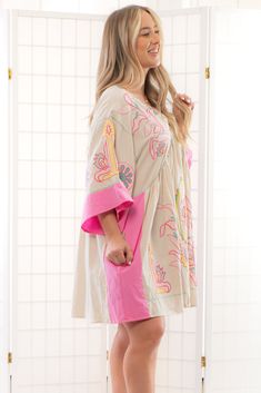 Get ready to flaunt your cute and trendy boho style with the Boho Embroidered Pink Babydoll Dress! The beautifully embroidered taupe fabric and colorblock trim in pink exude feminine and playful charm, while the oversized babydoll silhouette provides comfort and effortless style. The wide quarter length sleeves complete the look and make this dress perfect for beating the heat. Plus, the convenient side pockets add a practical touch to this gorgeous dress. Embrace your boho vibe with this must-h Pink Babydoll Dress, Jumper Denim, Taupe Fabric, Pink Babydoll, Silhouette Dress, Baseball Outfit, Graphic Tee Dress, Trendy Boho, Dress Silhouette