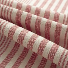 red and white striped fabric with vertical stripes