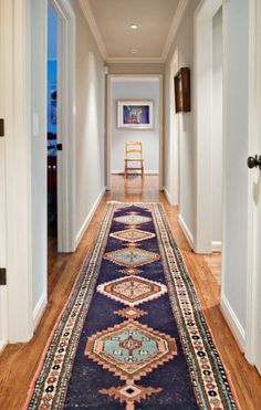 the hallway is clean and ready for us to use it as an entrance way in this home