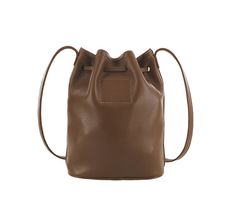 When it comes to a cool carry-all for just the essentials that's perfect on the go, it doesn't get much better than this bucket bag. Gracie features a rich, full-grain, unlined leather body, and leather drawstring strap for long lasting, laid-back style. Comfortable to wear over the shoulder or across the body, keeping your essentials close at hand and easily accessible.
Handcrafted in the U.S.A. (7.00"W, 8.50"H, 3.25"D) Trendy Soft Leather Bucket Bag For Travel, Leather Lined Bucket Bag For Travel In Fall, Fall Leather Bucket Bag, Fall Bucket Bag With Leather Lining For Daily Use, Trendy Leather Travel Bucket Bag, Soft Leather Bucket Backpack For Daily Use, Trendy Leather Bucket Bag For Travel, Chic Brown Duffle Bag For Daily Use, Trendy Leather Bucket Bag